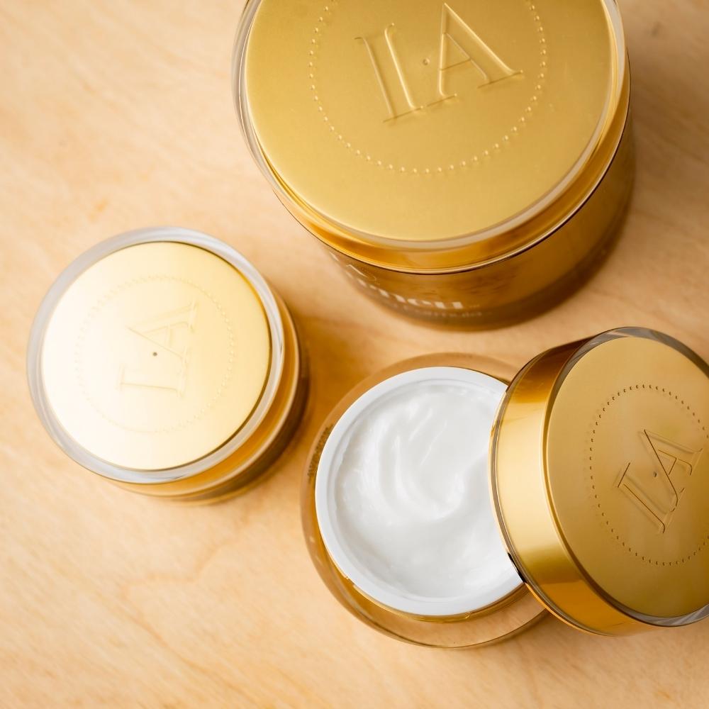 gold anti-aging formula in various sizes with anti aging cream showing