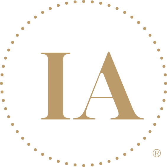Logo with 'IA' in gold letters inside a circle of dots on a white background InfiniteAloe | Healthy skin is simple