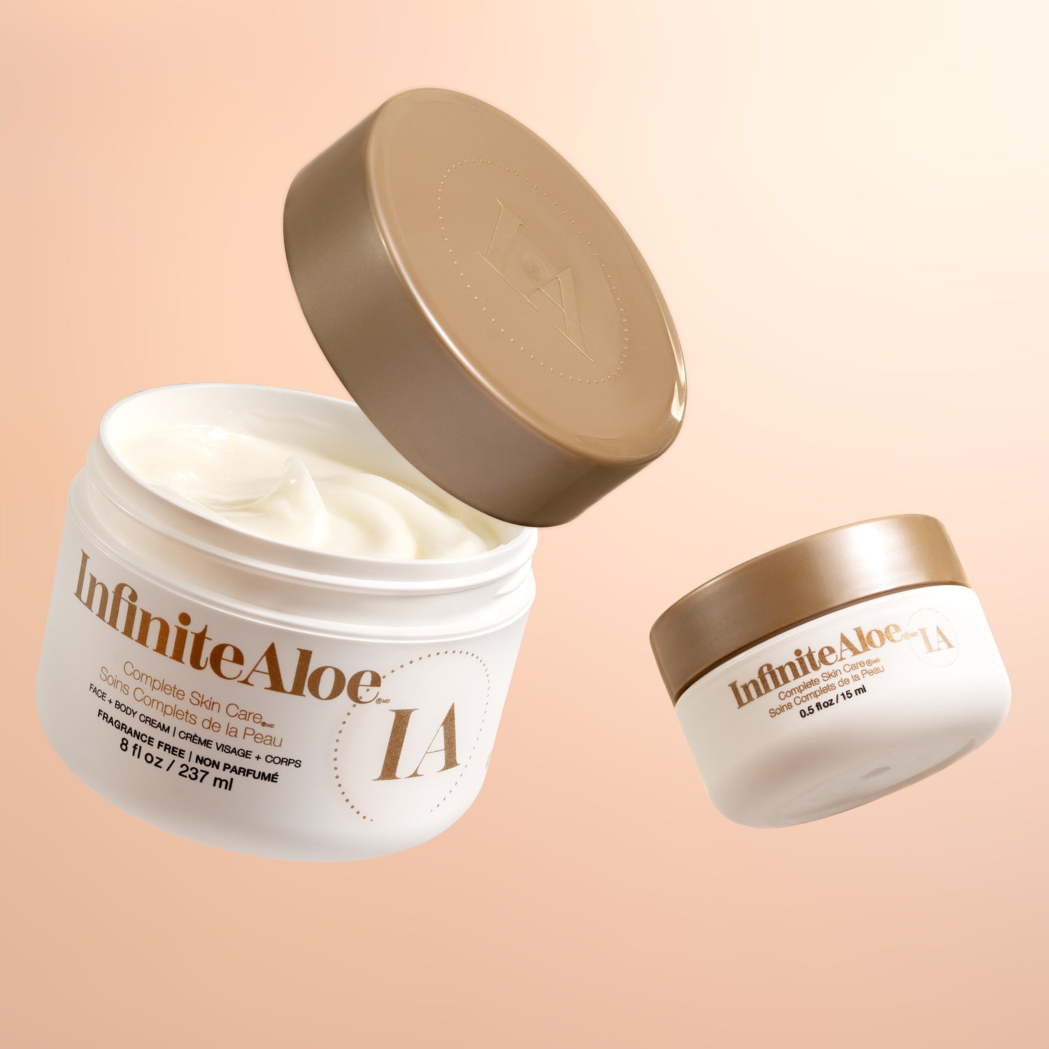 Two jars of Infinite Aloe cream on a beige background