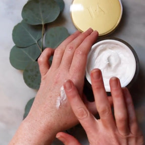 Gold cream on hands, face and neck